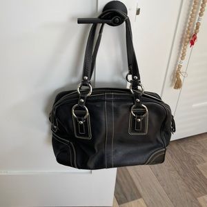 Coach extra roomie bag. Great if you need extra room to carry stuff
